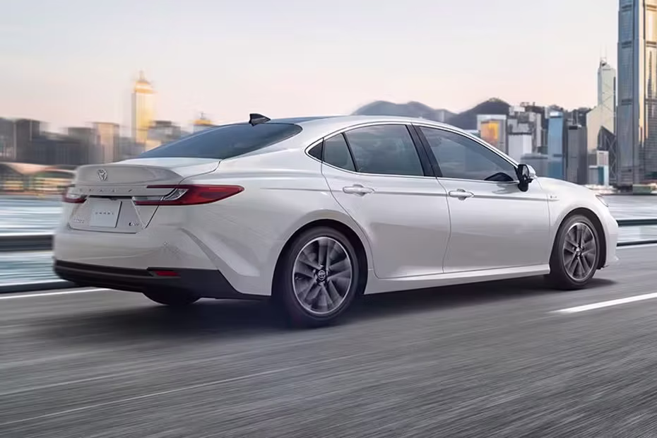 Toyota Camry Hybrid Rear Medium Side View With Tail Light And Wheel