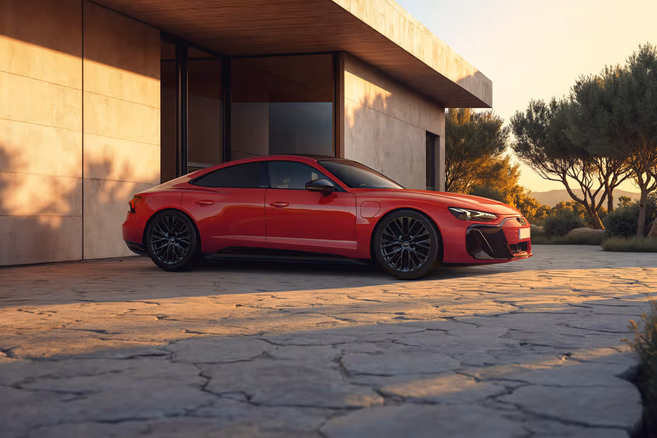 Audi E-tron GT 2026 front left side angle view on city street