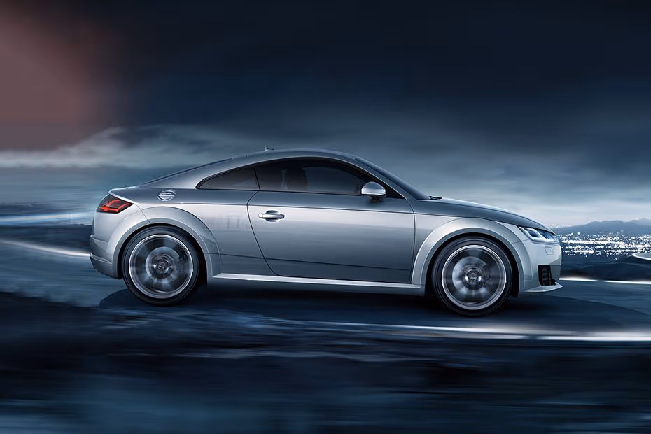 Audi TT Coupe 2026 right side profile with alloy wheels