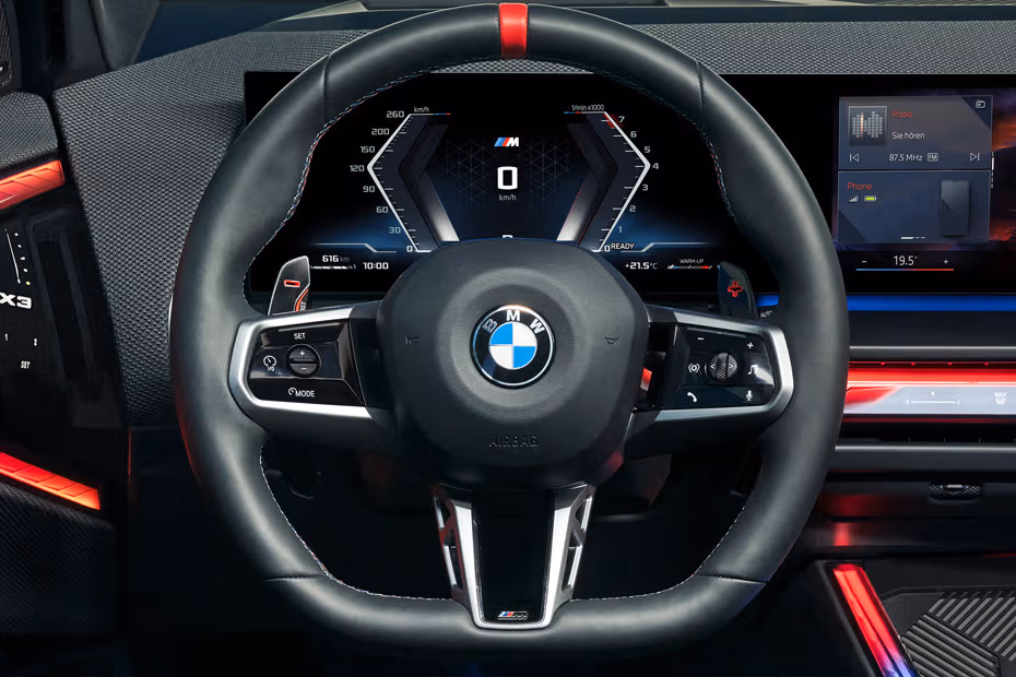 BMW X3 2026 SUV Steering wheel with paddle shifters close-up view