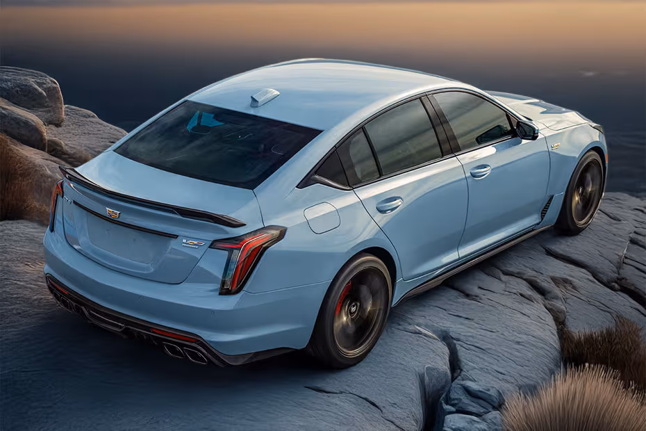 Cadillac CT5 V 2026 Rear right side angle view showing taillights, tailgate and alloy wheels