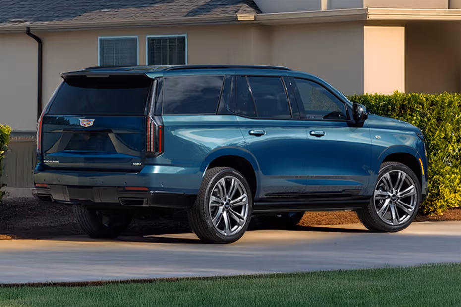 Cadillac Escalade 2026 Rear Left Side Angle View Showing Taillights, Tailgate and Alloy Wheels