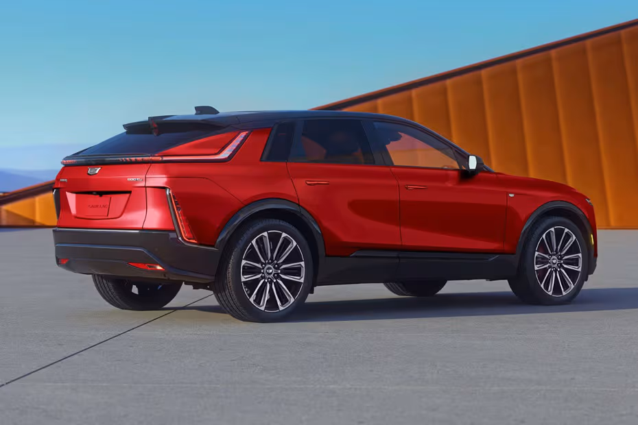 Cadillac LYRIQ 2026 Rear Left Side Angle View Showing Taillights, Tailgate and Alloy Wheels