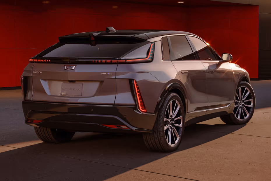 Cadillac LYRIQ 2026 Rear Left Side Angle View Showing Taillights, Tailgate and Alloy Wheels