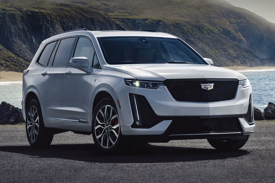 Cadillac XT6 2026 Front right side angle view on city street