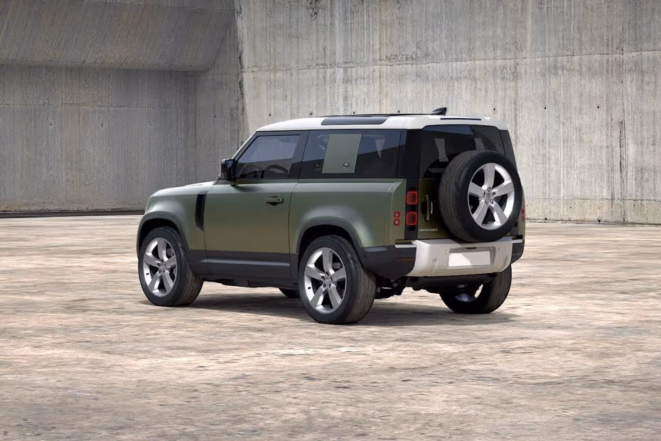 Land Rover DEFENDER 90 2026 Rear Left Side Angle View Showing Taillights, Tailgate and Alloy Wheels