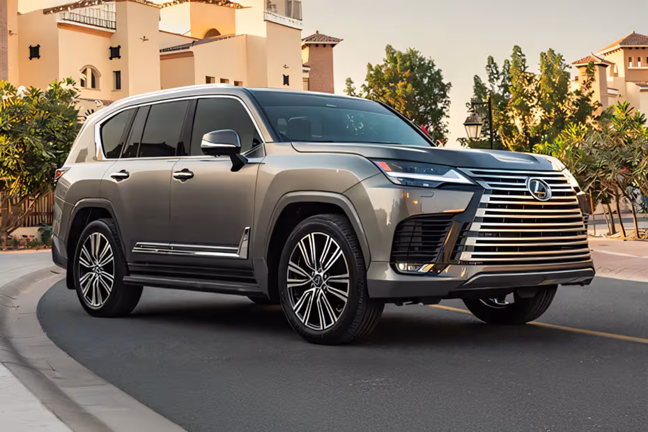 Lexus LX 700H 2026 front right side angle view on city street