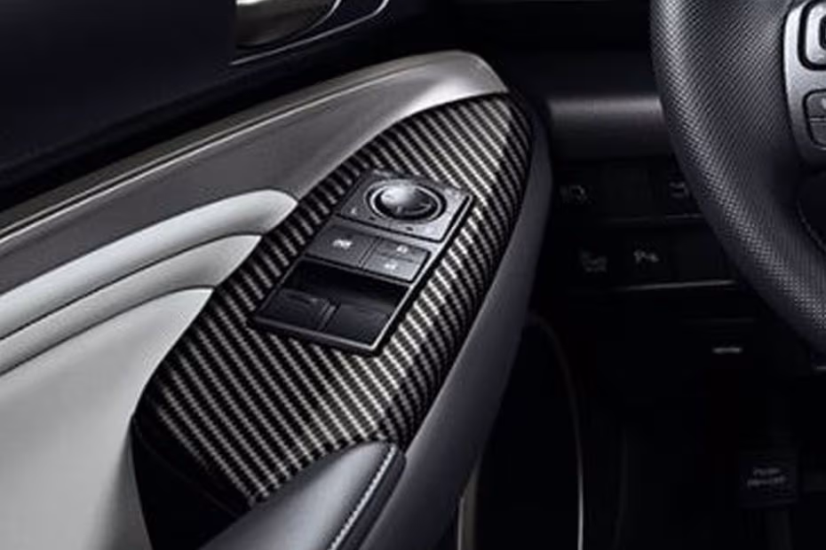 Lexus RC F 2026 power window switches and side mirror adjustment controls on driver door