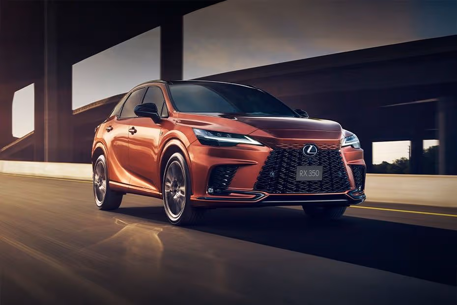 Lexus RX 2026 front right side angle view on city street