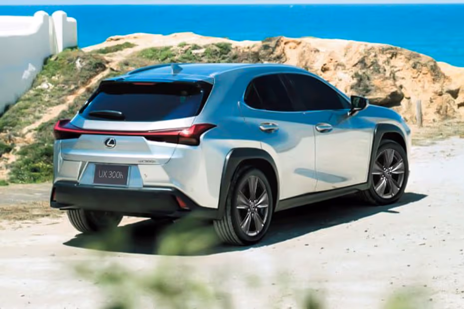 Lexus UX300H 2026 SUV Sonic Quartz Rear Left side angle view showing taillights