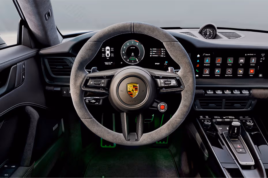 Porsche 911 2026 Steering wheel with brand emblem and multifunction steering controls