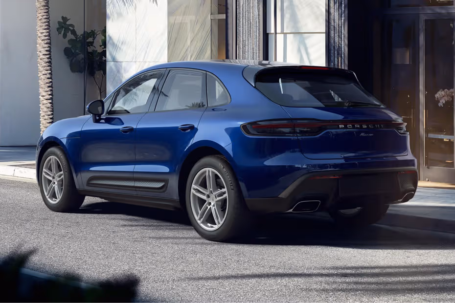 Porsche Macan 2026 Rear Left side angle view showing taillights, tailgate and alloy wheels
