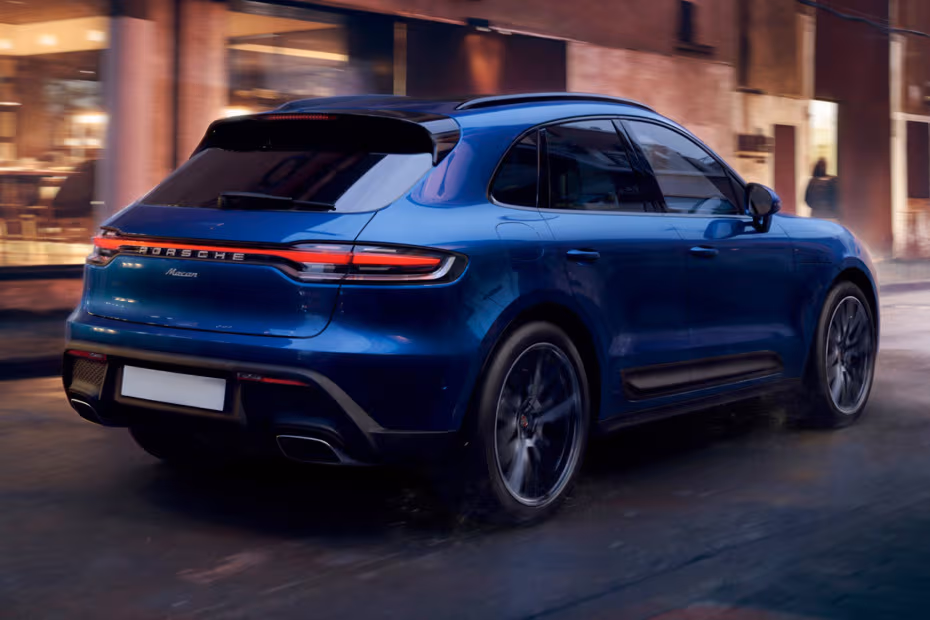 Porsche Macan 2026 Rear Right Side Angle View Showing Taillights, Tailgate and Alloy Wheels
