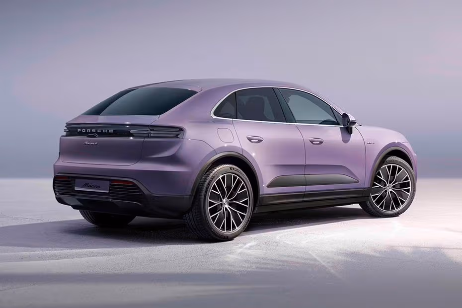 Porsche Macan Electric 2026 Rear Right Side Angle View Showing Taillights, Tailgate and Alloy Wheels