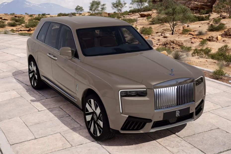 Rolls Royce Cullinan 2026 SUV Front Left Side Angle View on City Street
