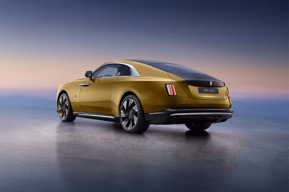 Rolls Royce Spectre 2026 Rear Left Side Angle View Showing Taillights, Tailgate and Alloy Wheels