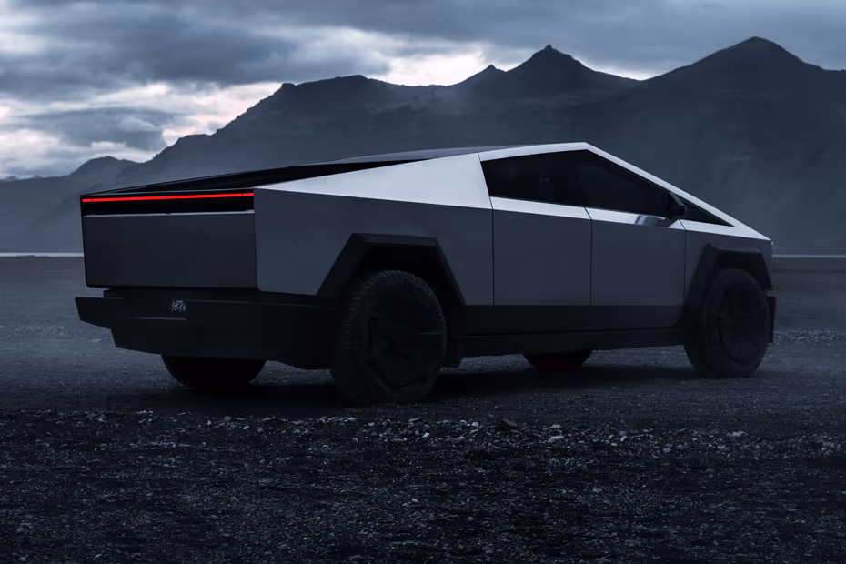 Tesla Cybertruck 2026 Rear Left Side Angle View Showing Taillights, Tailgate and Alloy Wheels