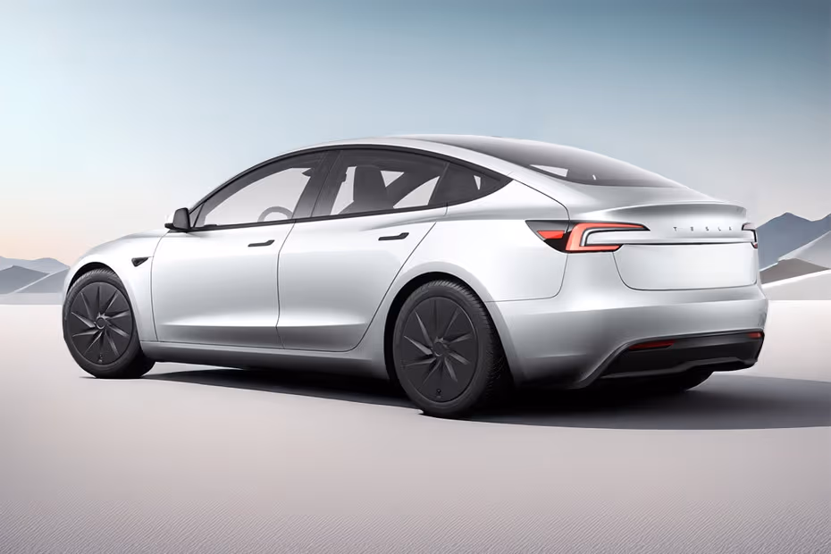 Tesla Model 3 2026 Rear Left Side Angle View Showing Taillights, Tailgate and Alloy Wheels
