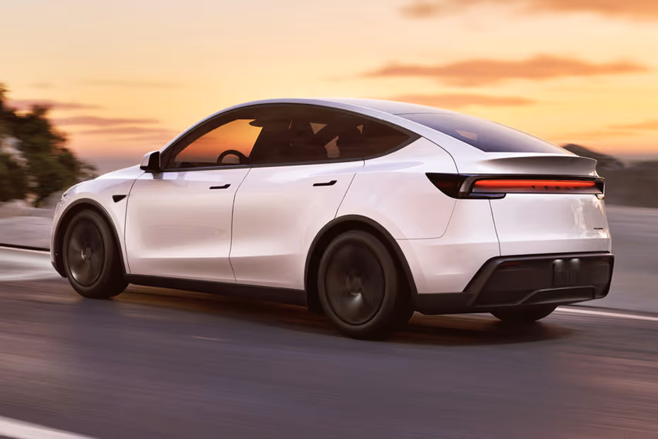 Tesla Model Y 2026 Rear Left Side Angle View Showing Taillights, Tailgate and Alloy Wheels