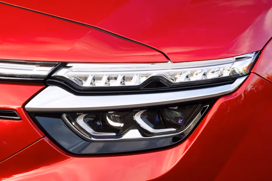 VINFAST VF8 2026 headlight close-up with integrated LED DRLs
